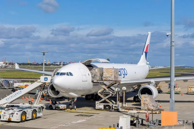 Cargo being loaded into an aircraft on the apron
